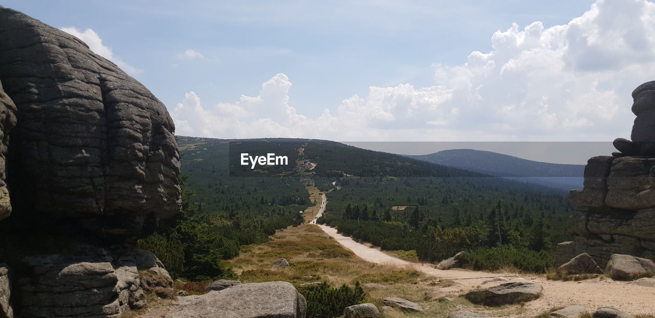 Scenic view of rocky mountains against sky