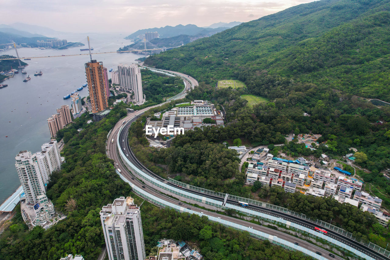 Aerial view of s shape highway across the mountain
