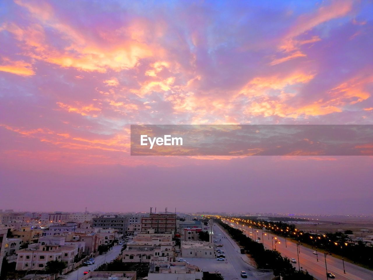 High angle view of townscape against sky during sunset