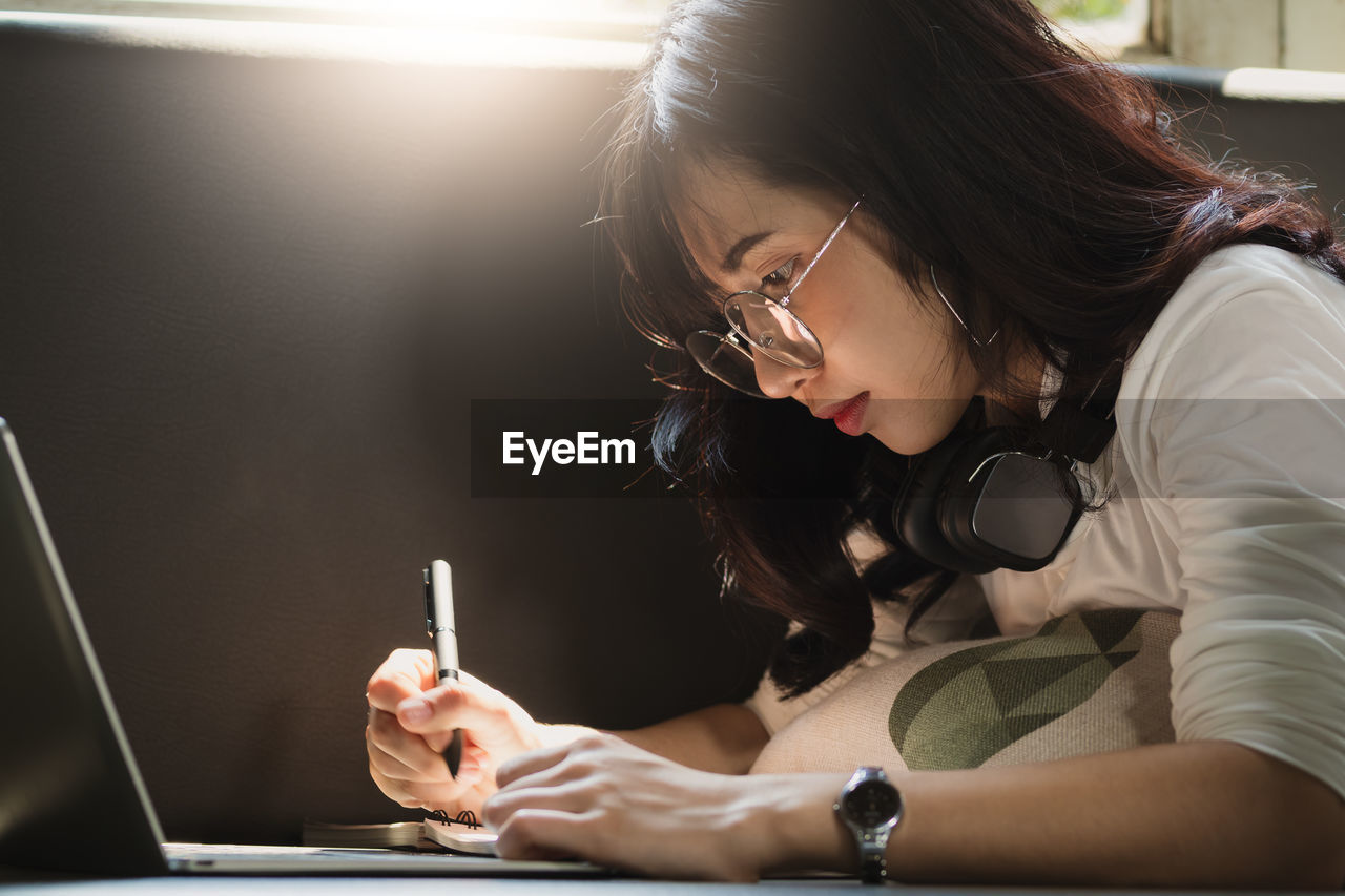 Young woman working on laptop