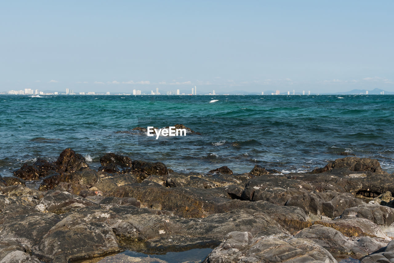 Scenic view of sea against clear sky