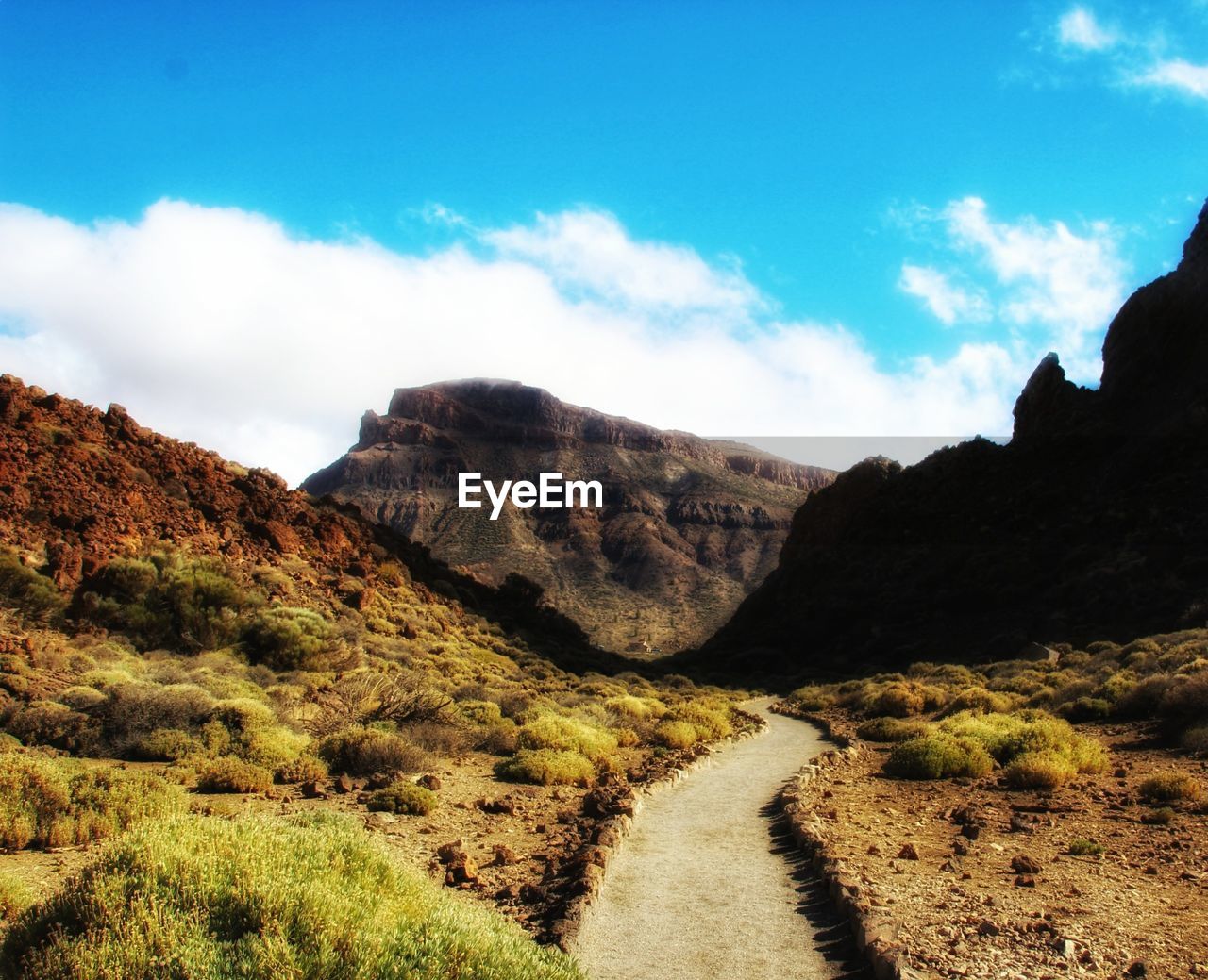 SCENIC VIEW OF MOUNTAIN AGAINST SKY