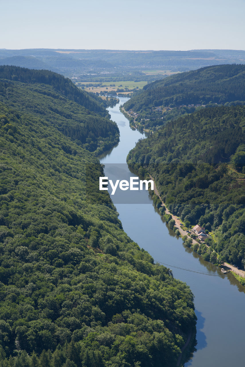 water, scenics - nature, aerial photography, environment, beauty in nature, nature, land, landscape, river, no people, plant, reservoir, sky, tranquility, tree, high angle view, non-urban scene, aerial view, day, tranquil scene, outdoors, mountain, green, coast, body of water, travel destinations, travel, blue, tourism, forest, clear sky, idyllic, reflection