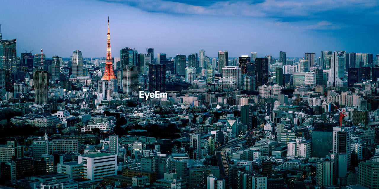 Aerial view of cityscape against sky