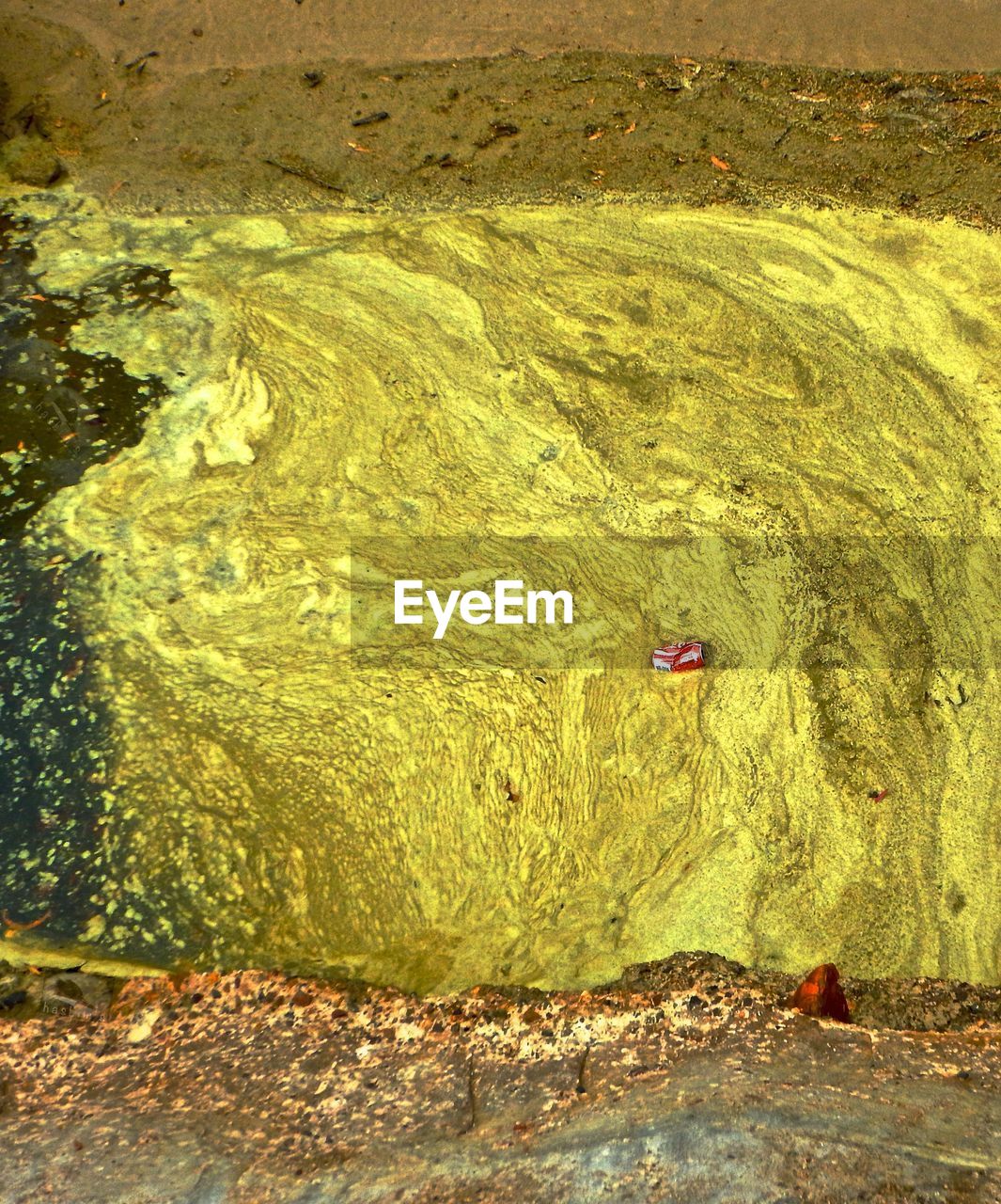 High angle view of dirty gutter