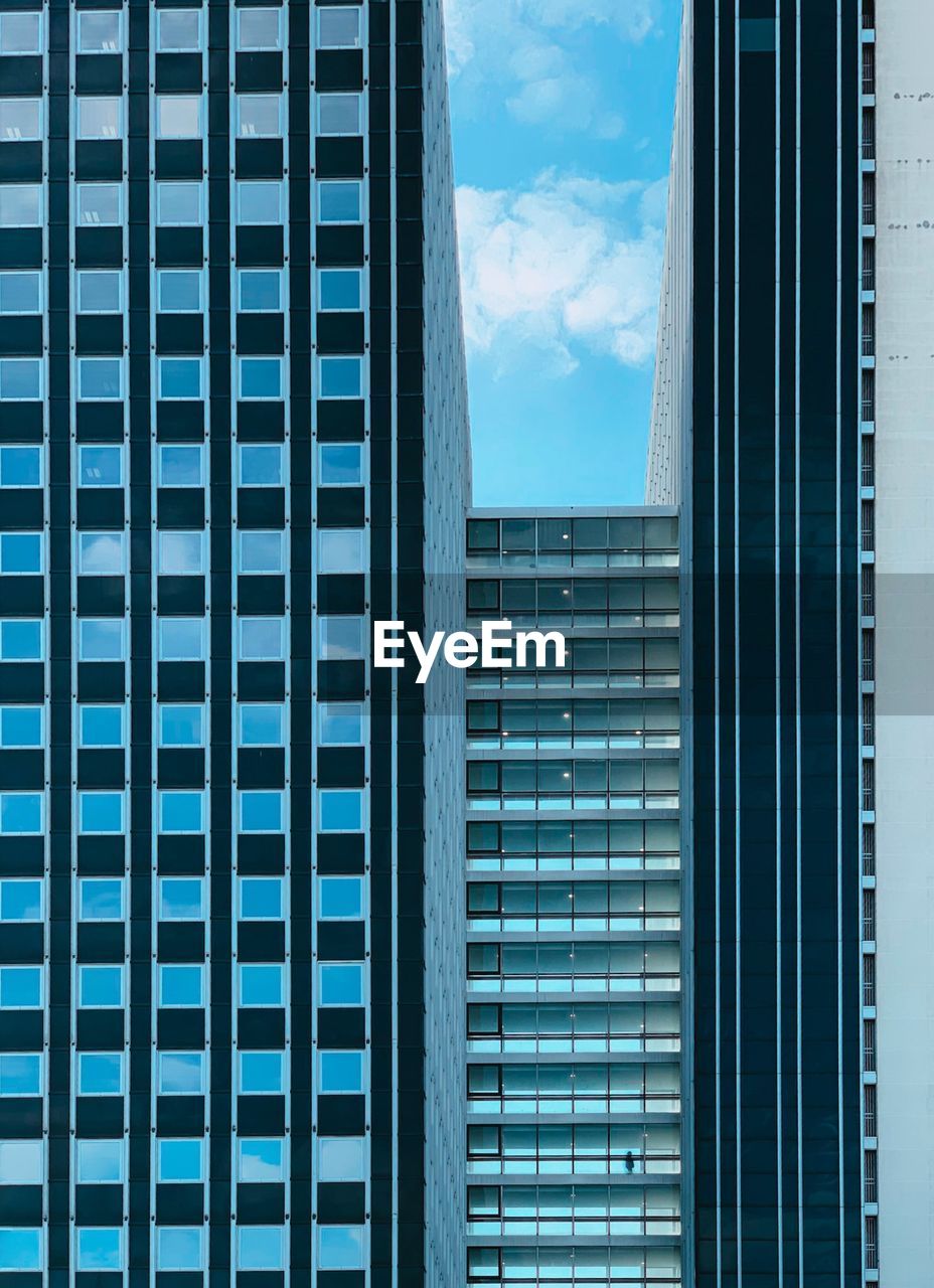 Low angle view of modern building against sky