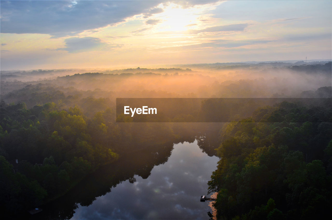 SCENIC VIEW OF TREE MOUNTAINS AGAINST SKY