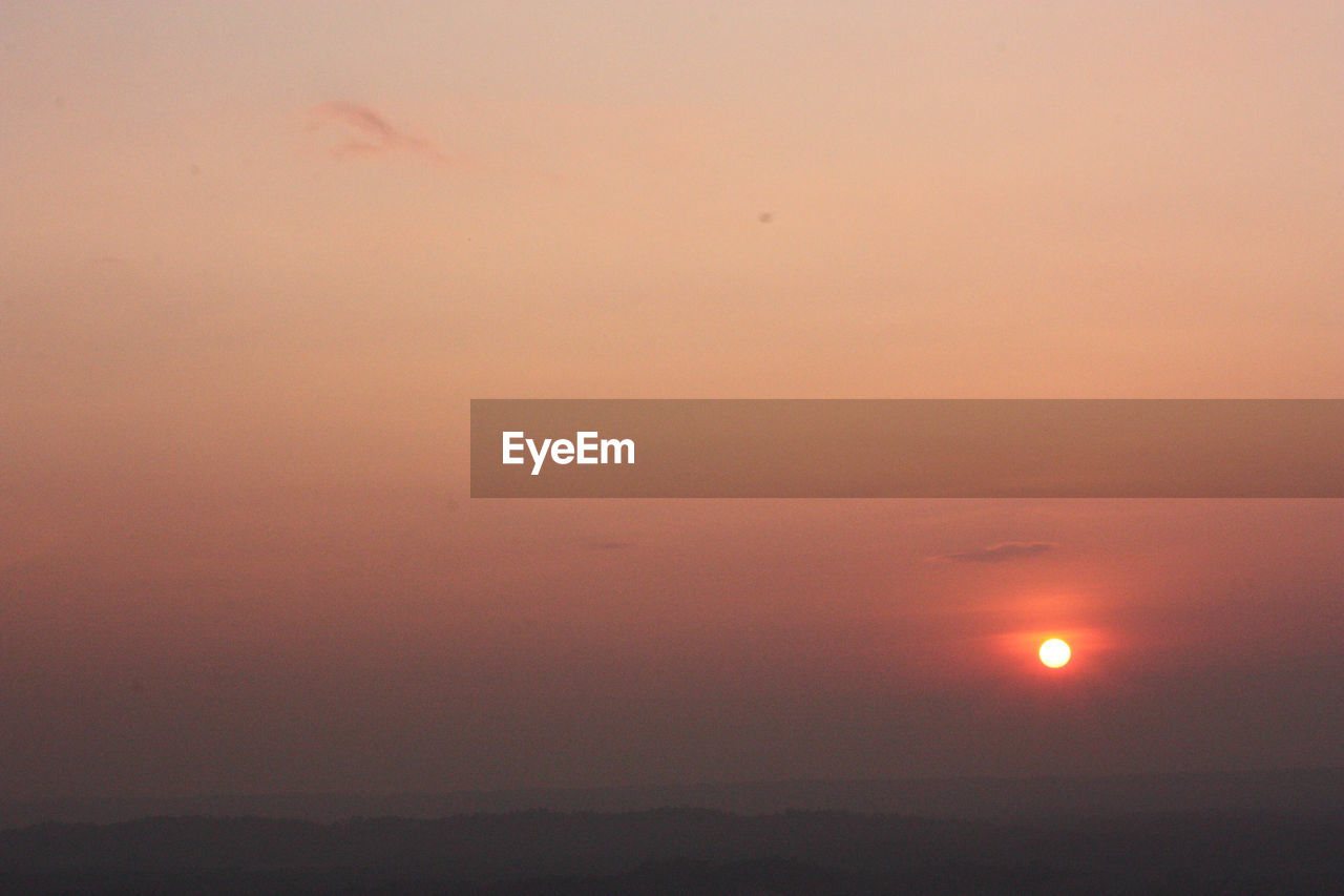 SCENIC VIEW OF SUNSET AGAINST SKY