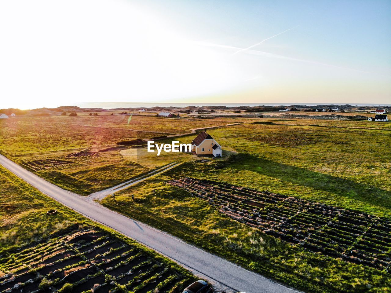 SCENIC VIEW OF FARM AGAINST SKY