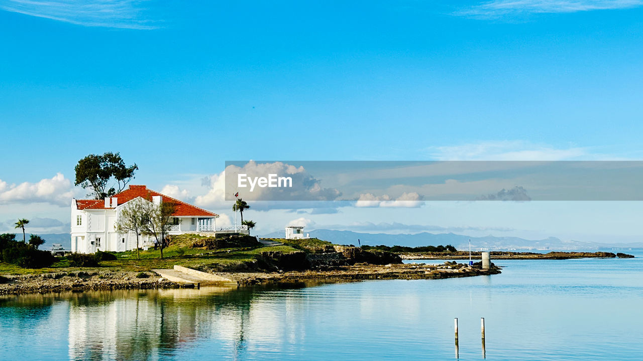 scenic view of sea against blue sky