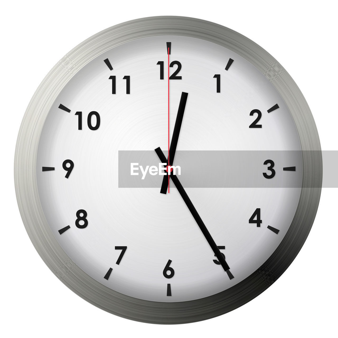 CLOSE-UP OF CLOCK OVER WHITE BACKGROUND
