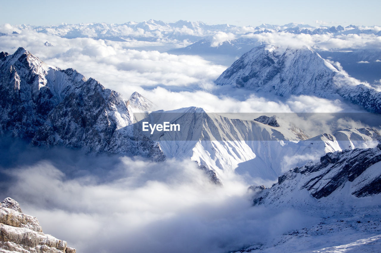 High angle view of snow capped mountains. dramatic