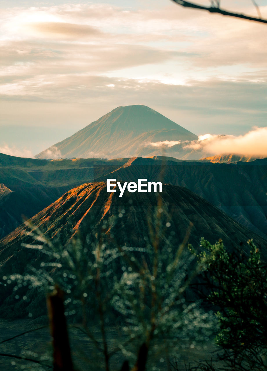 Scenic view of landscape against sky during sunset