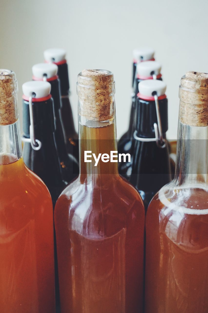 Close-up of wine bottles on table