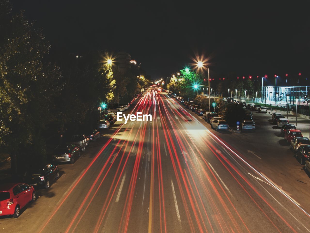 Light trails on road in city at night