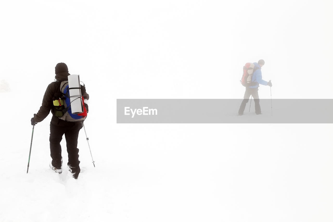 People hiking in snow