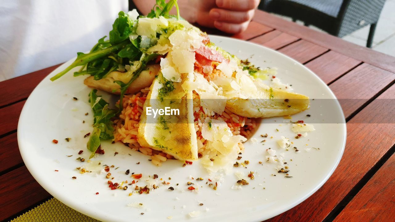 HIGH ANGLE VIEW OF MEAL SERVED ON TABLE