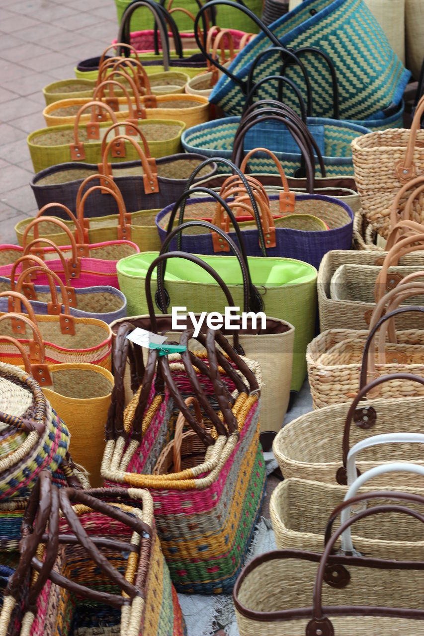 High angle view of shopping bags for sale at street market
