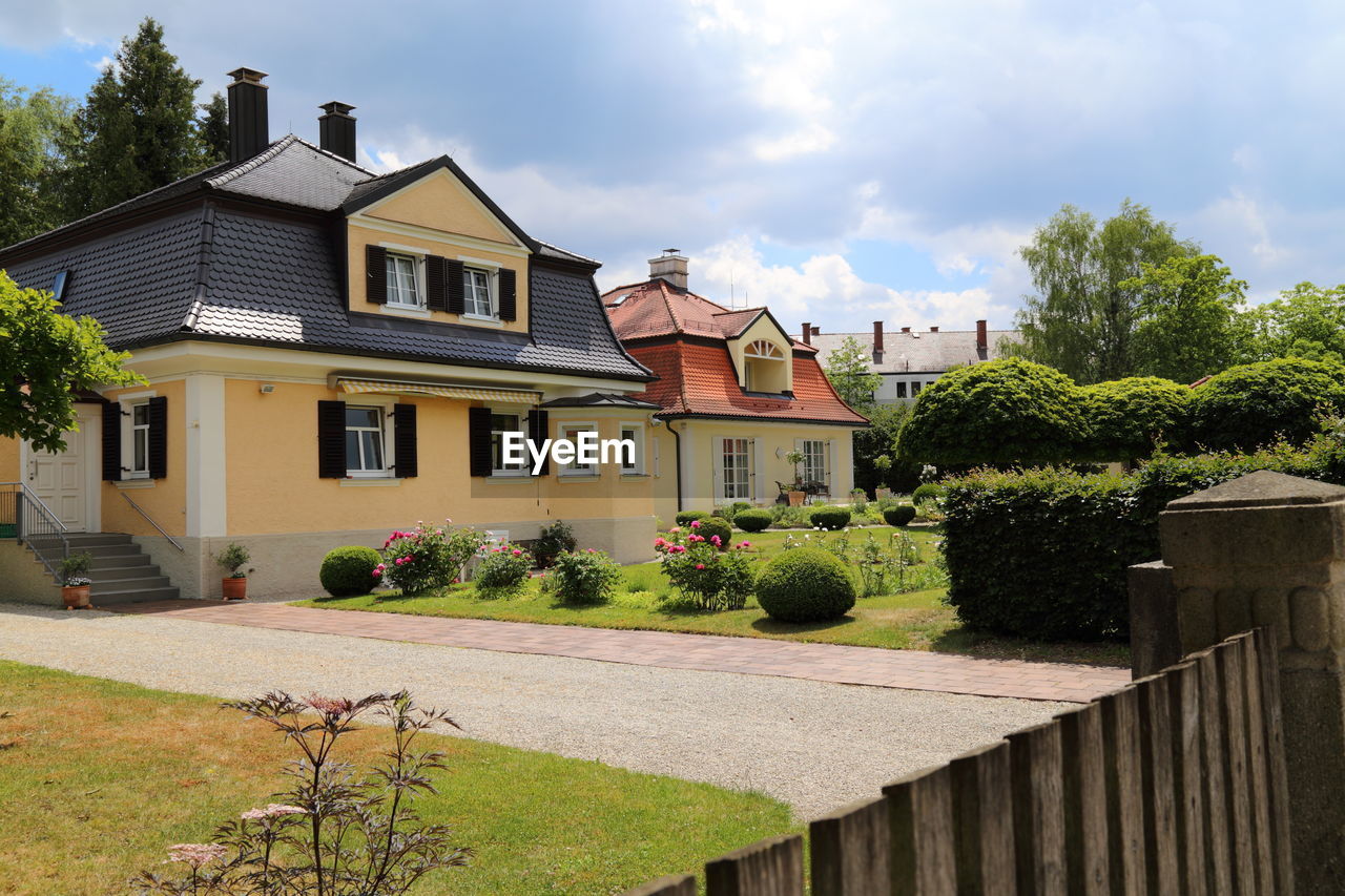 HOUSES AGAINST SKY