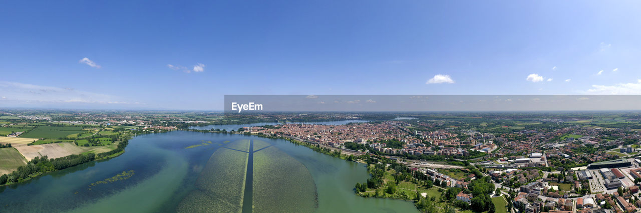 AERIAL VIEW OF BUILDINGS AGAINST SKY