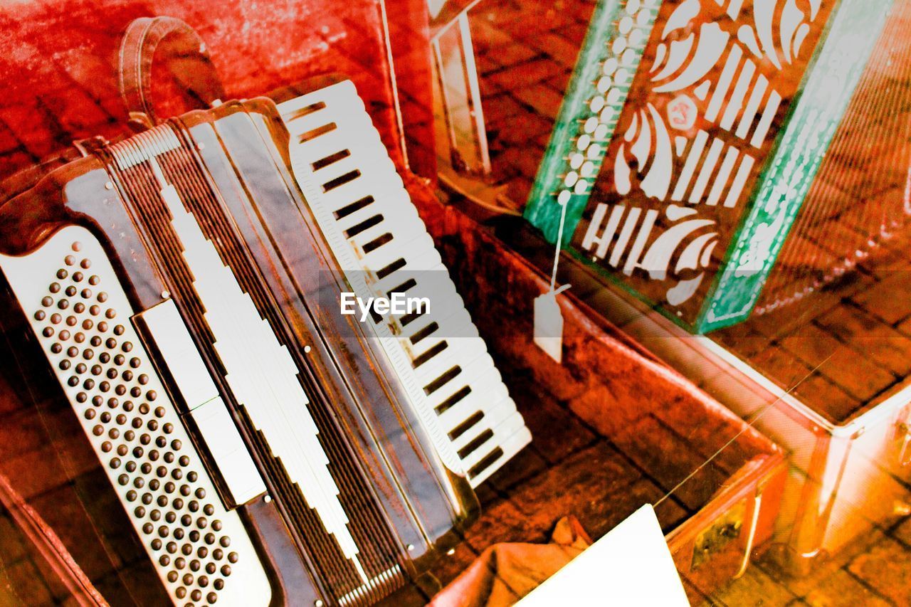 High angle view of accordion for sale in shop