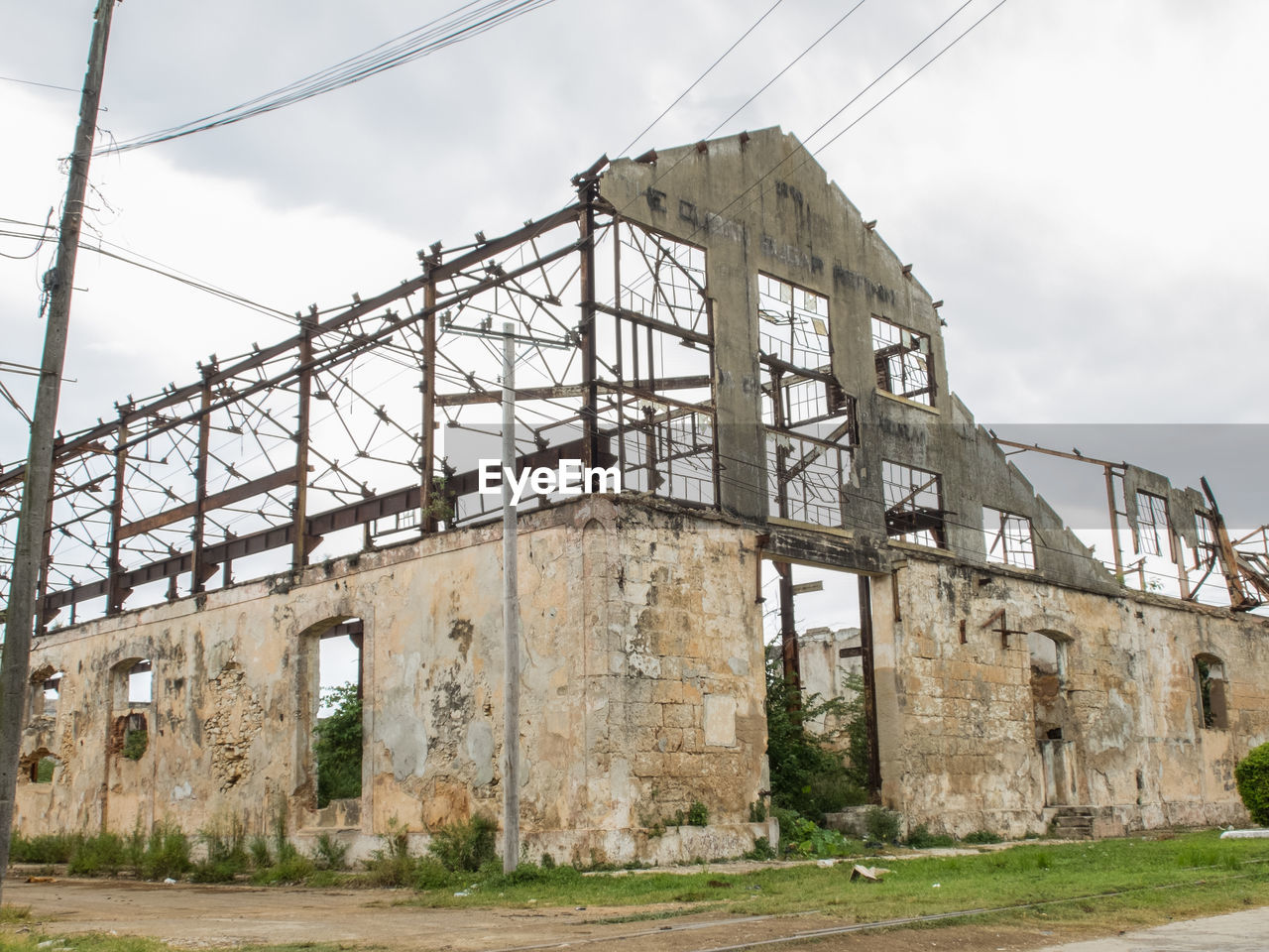 Abandoned built structure against the sky