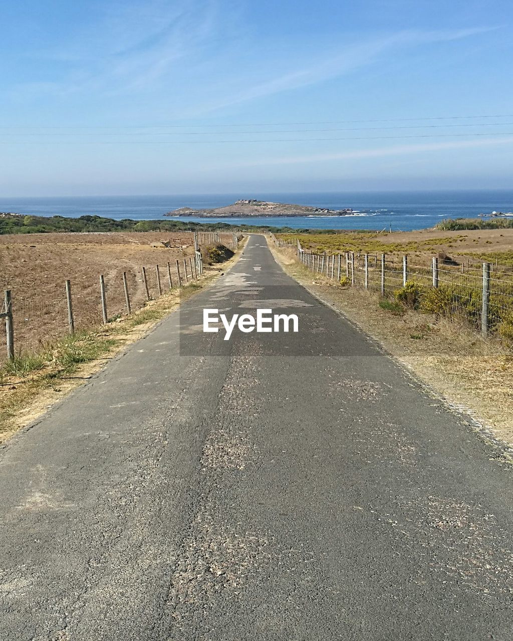 Empty road along the sea