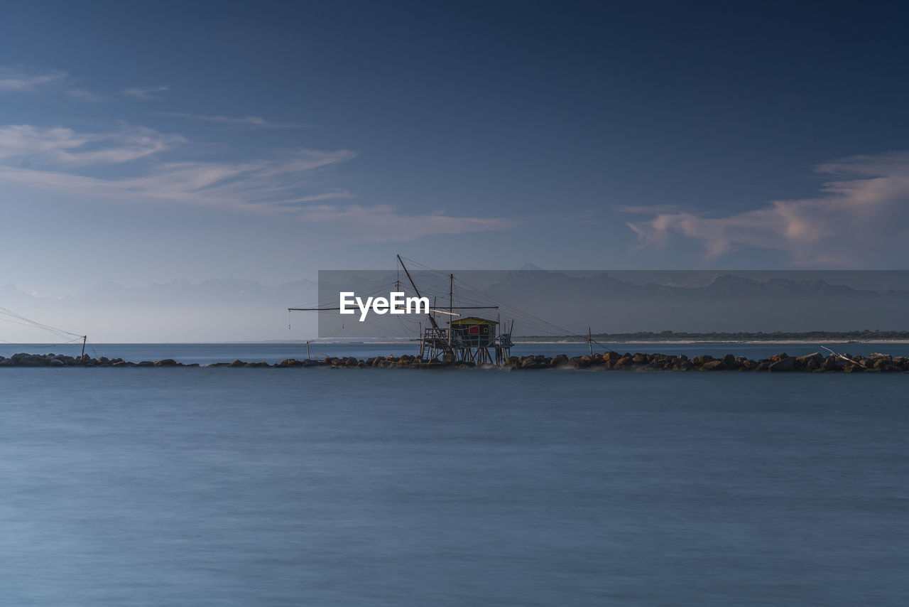 scenic view of sea against blue sky