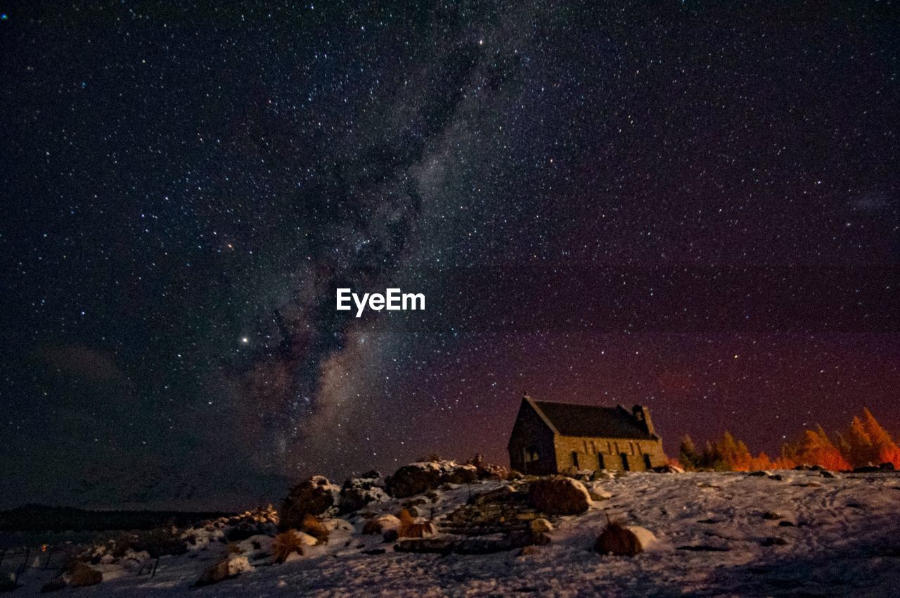 SCENIC VIEW OF ROCKS AT NIGHT