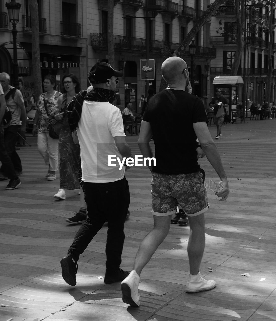 WOMAN WALKING ON STREET