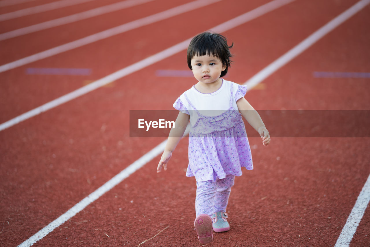 Portrait of girl running