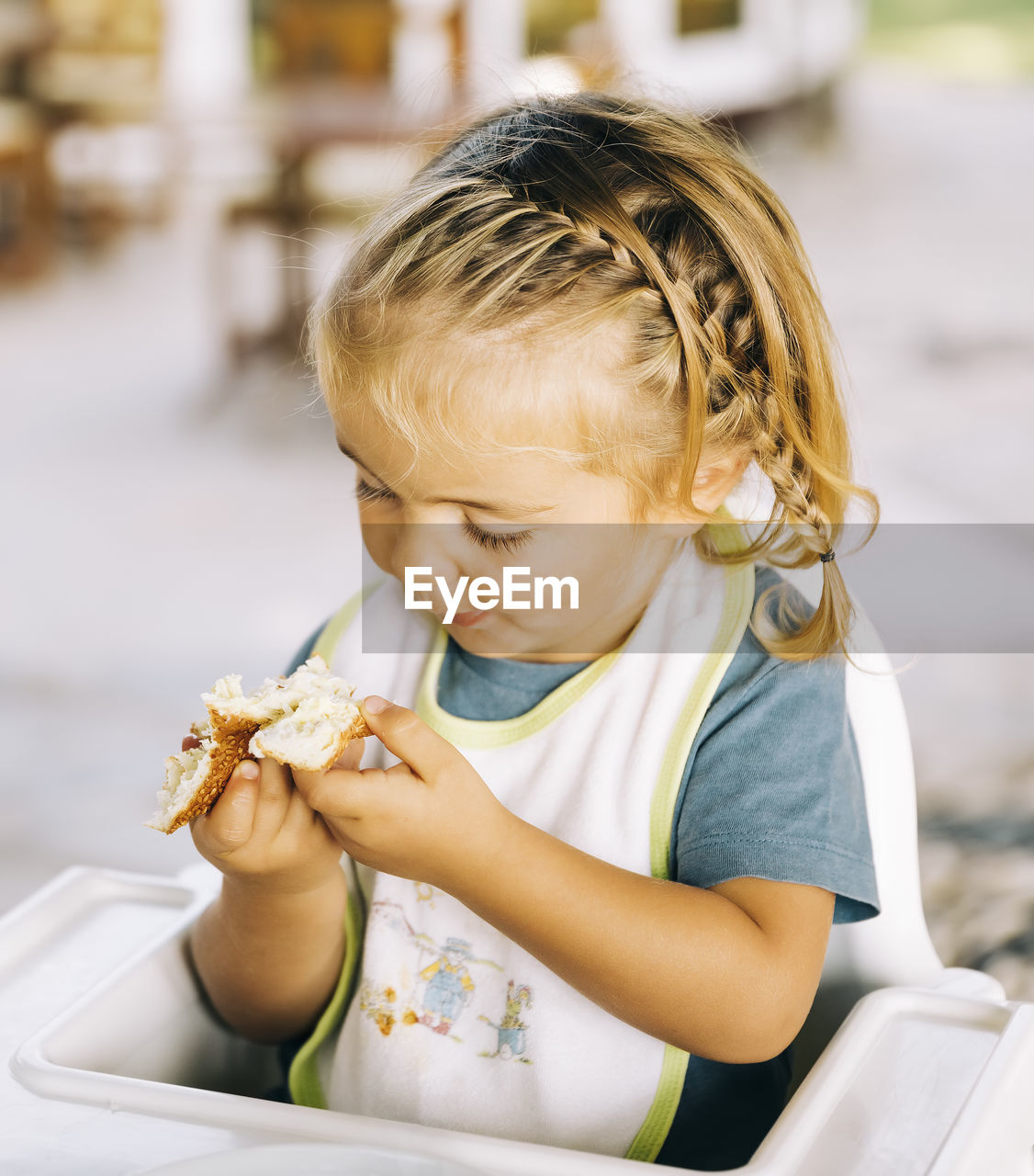 CUTE GIRL HOLDING ICE CREAM IN CONTAINER