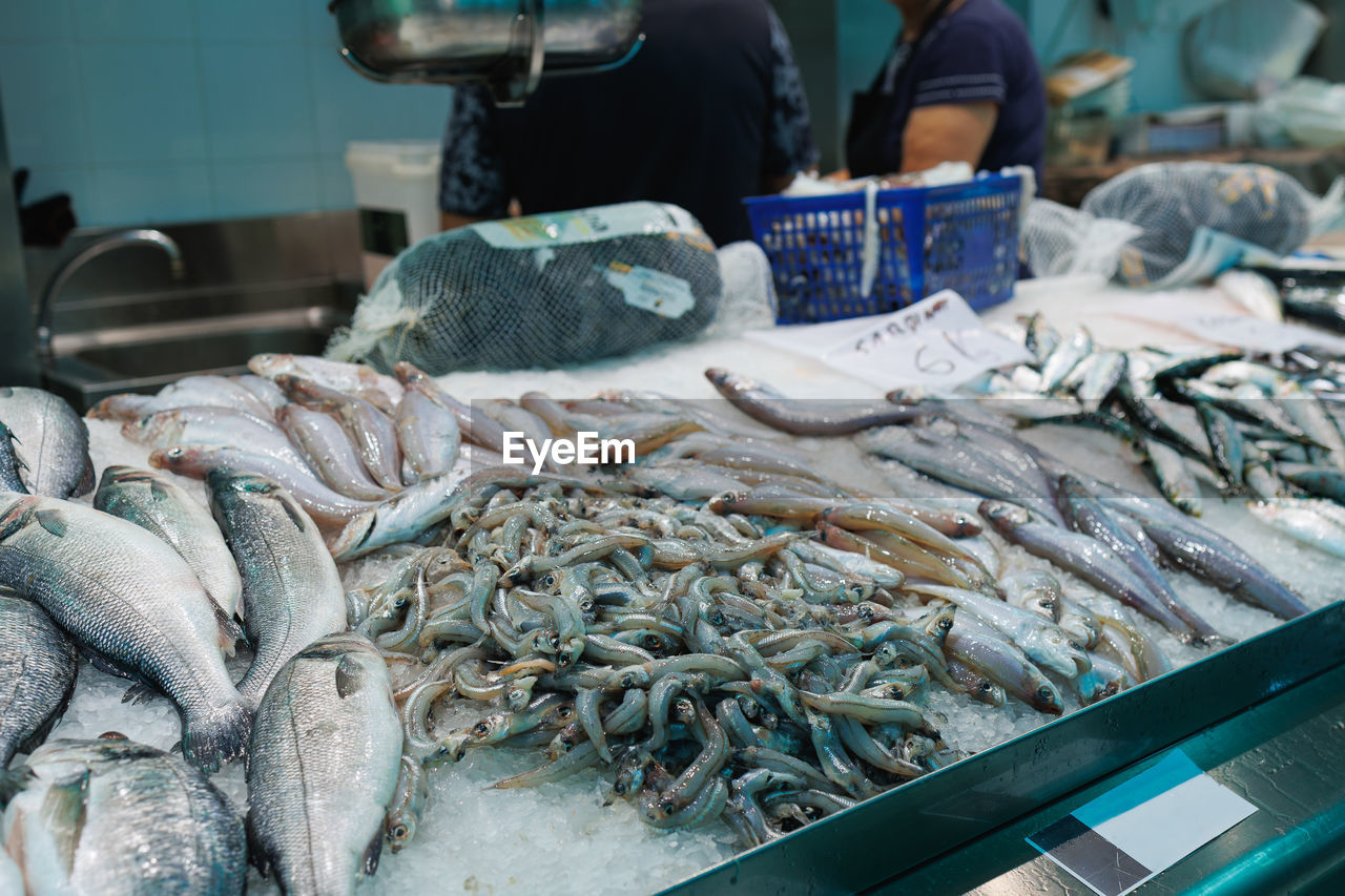 high angle view of seafood for sale at market stall