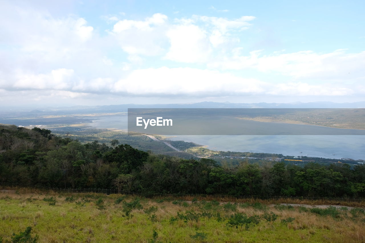 SCENIC VIEW OF LANDSCAPE AND MOUNTAIN AGAINST SKY