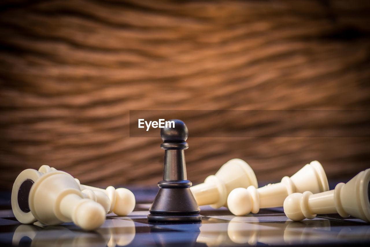 Close-up of chess pieces on board