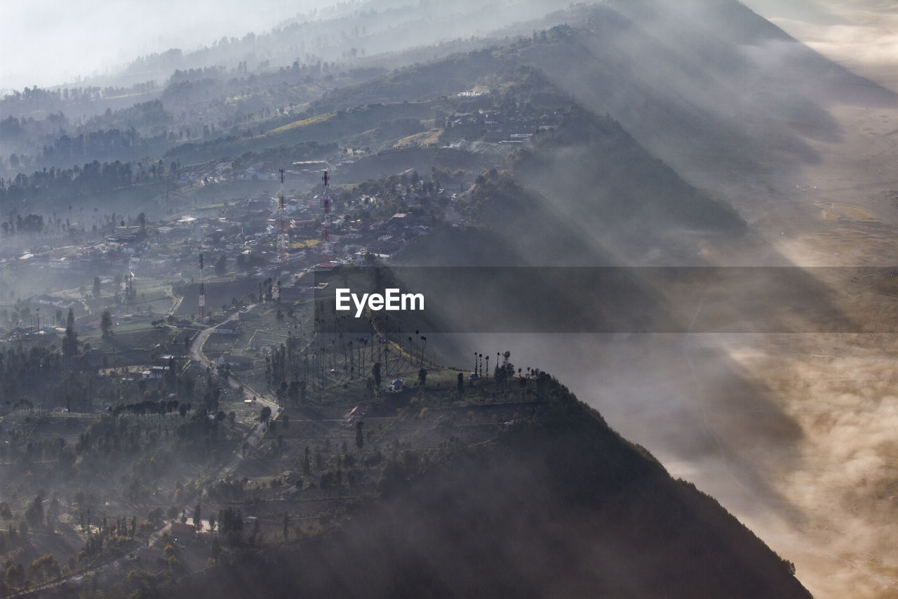 Aerial view of ngadisari village, probolinggo, indonesia on foggy morning