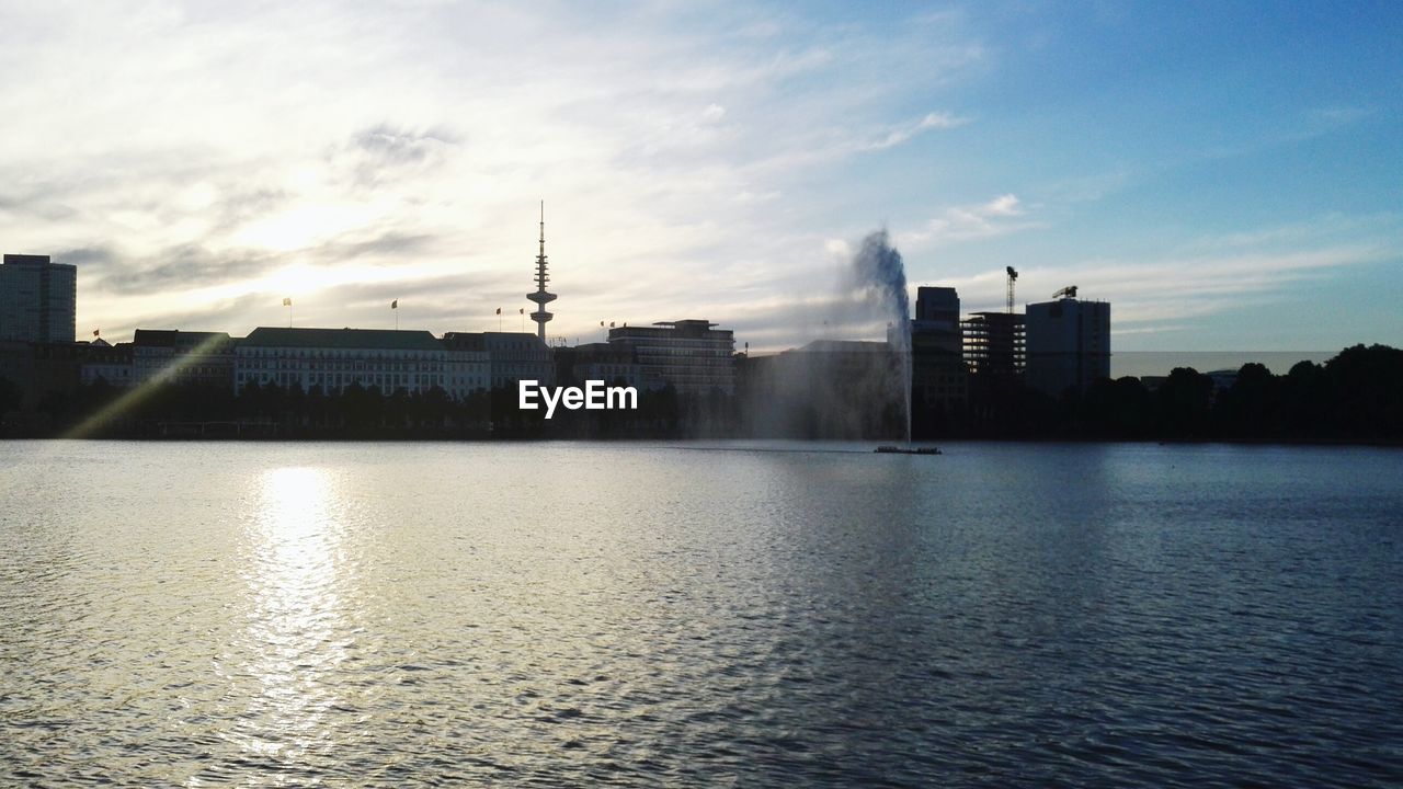 Buildings in distance with waterfront