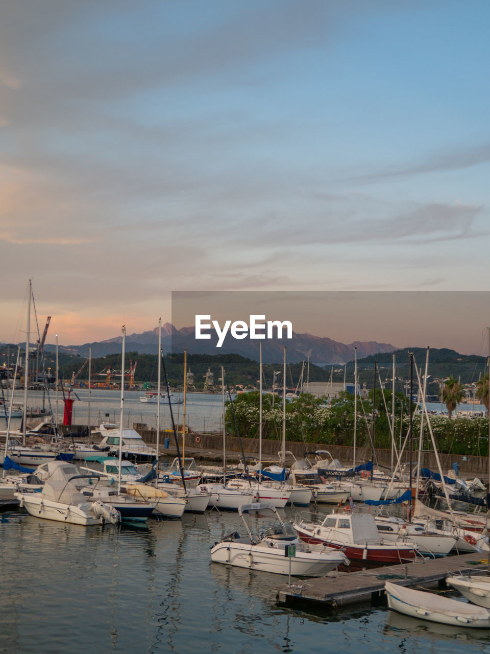 water, nautical vessel, transportation, marina, sky, mode of transportation, moored, sea, harbor, sailboat, dock, nature, mast, no people, pole, ship, cloud, beauty in nature, tranquility, mountain, boat, sunset, travel, vehicle, scenics - nature, bay, beach, tranquil scene, architecture, travel destinations, idyllic, reflection, outdoors, land, waterfront, day, yacht, holiday, port, vacation