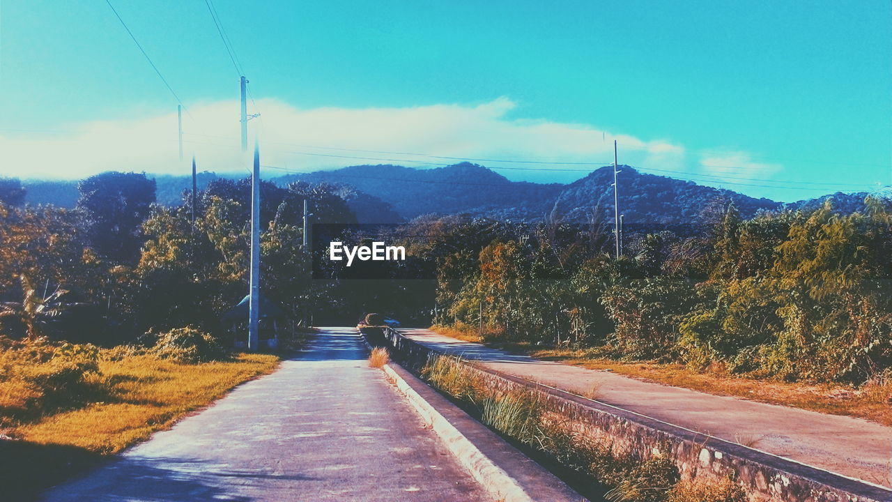 ROAD PASSING THROUGH MOUNTAINS