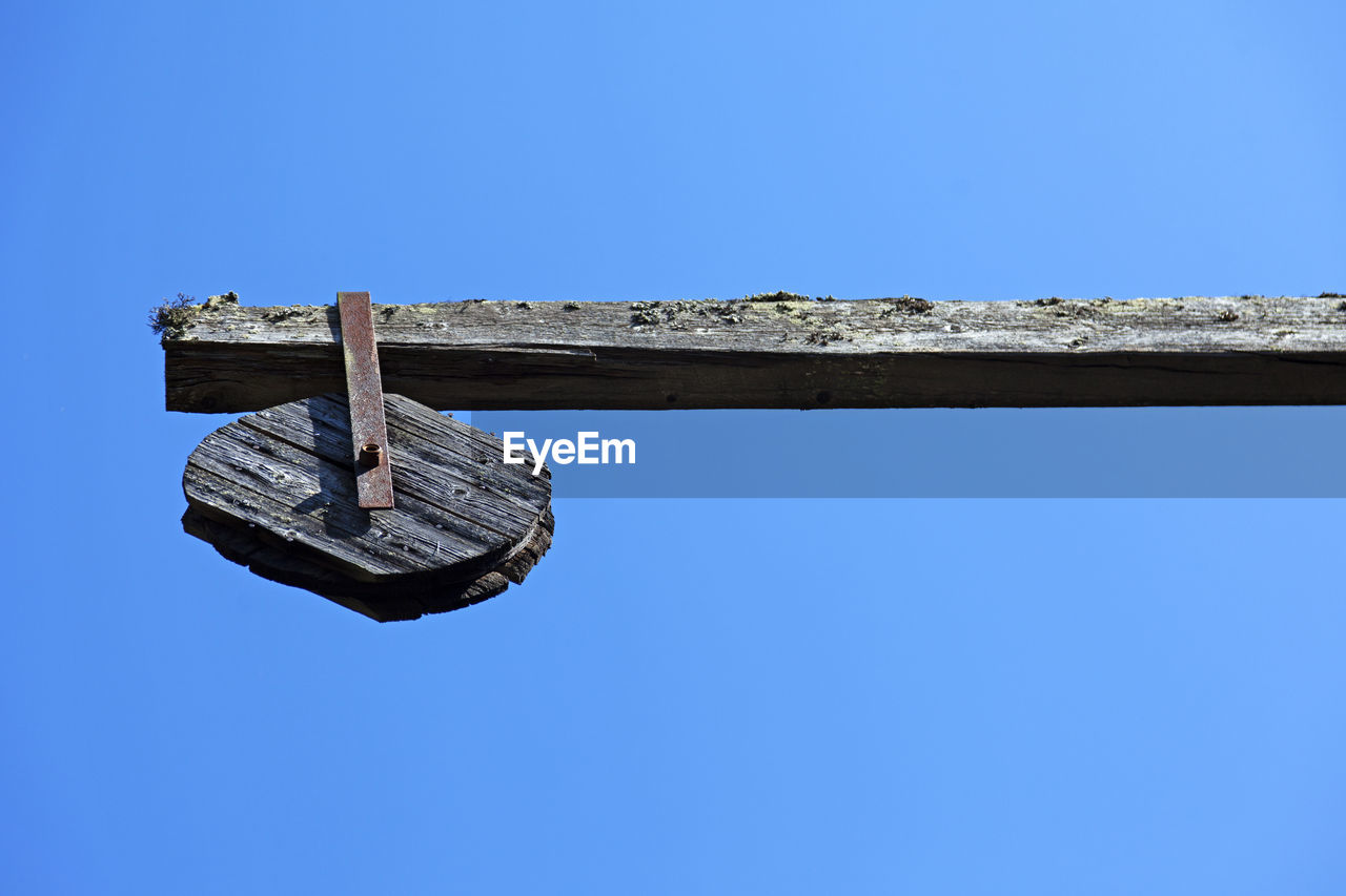 An ancient wooden winch used to hoist grain