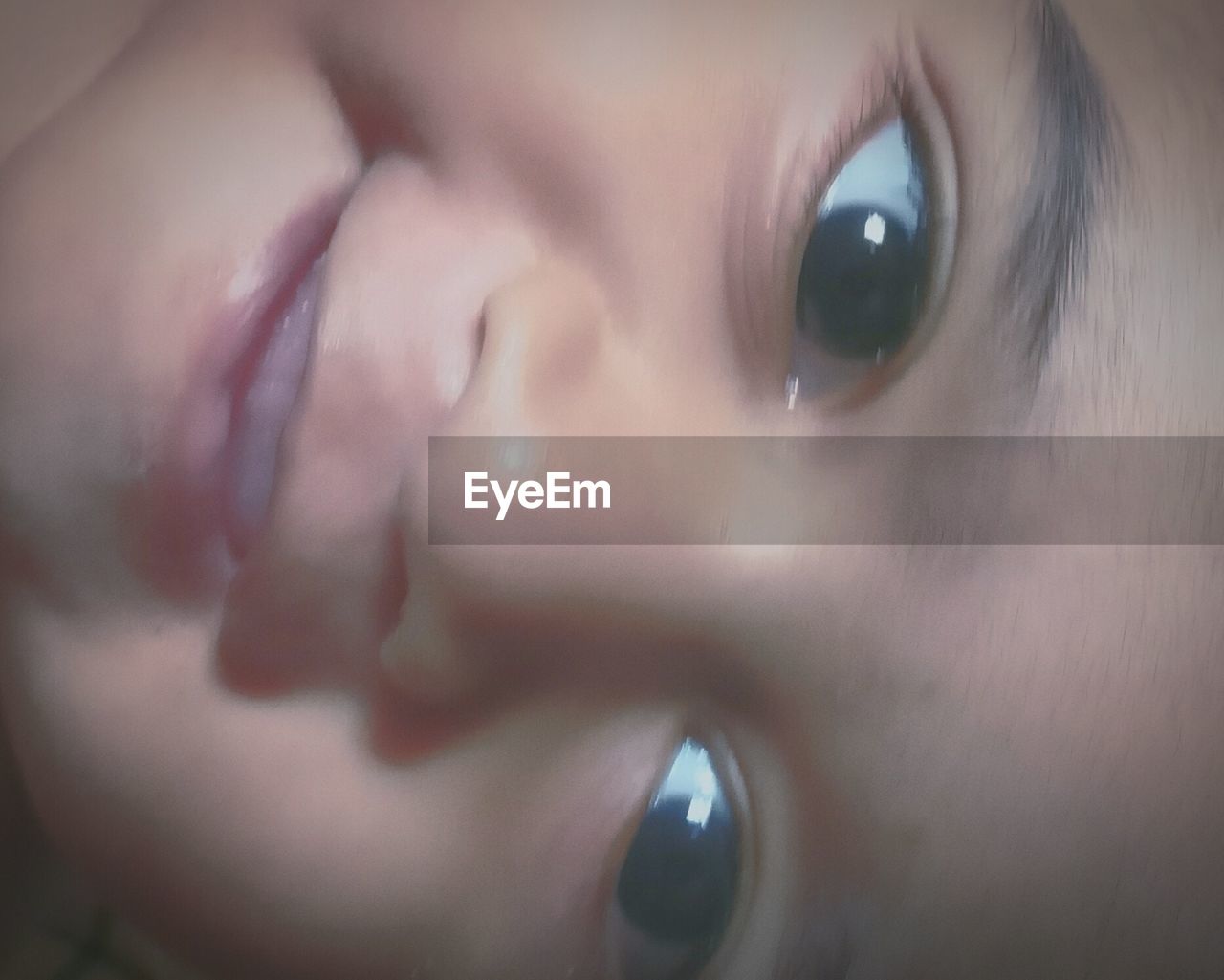 CLOSE-UP PORTRAIT OF CUTE BABY