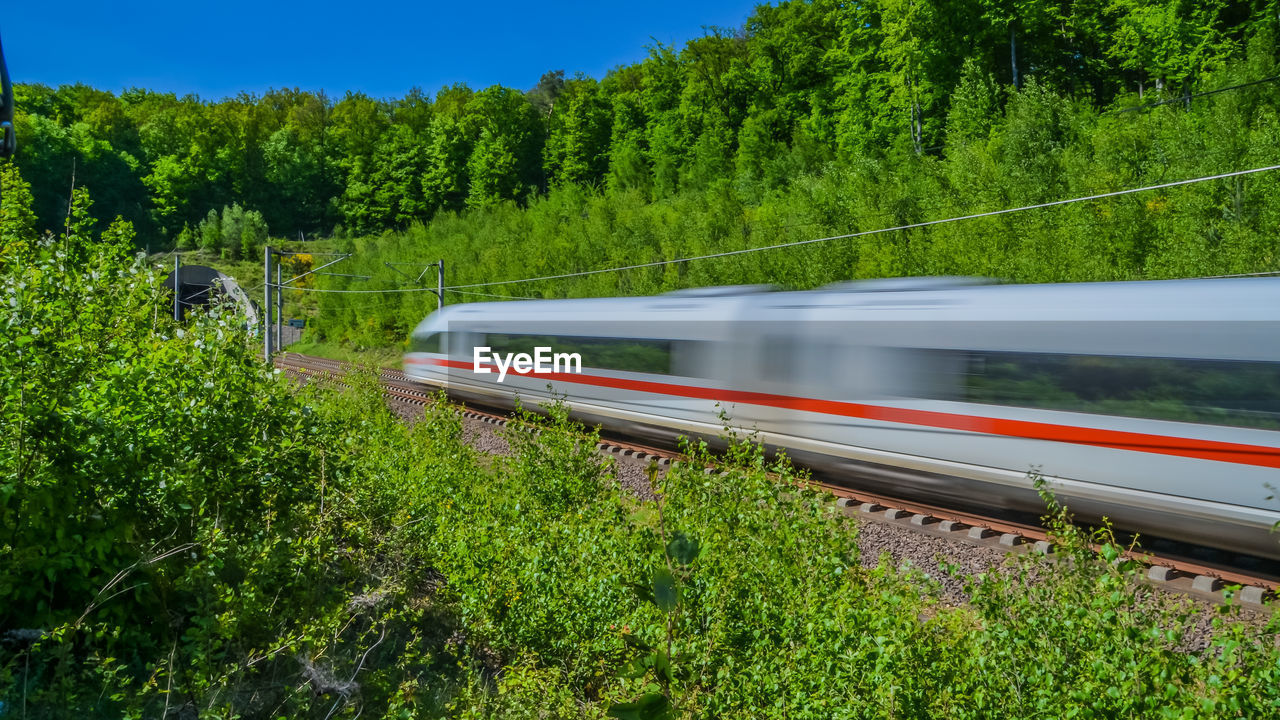 BLURRED MOTION OF TRAIN ON LAND