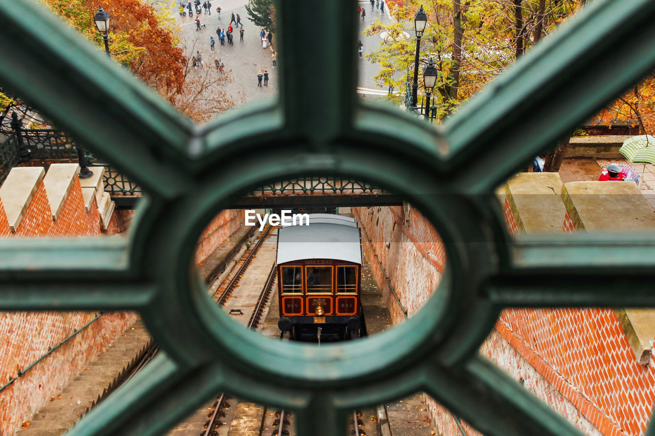 High angle view of train seen through metal