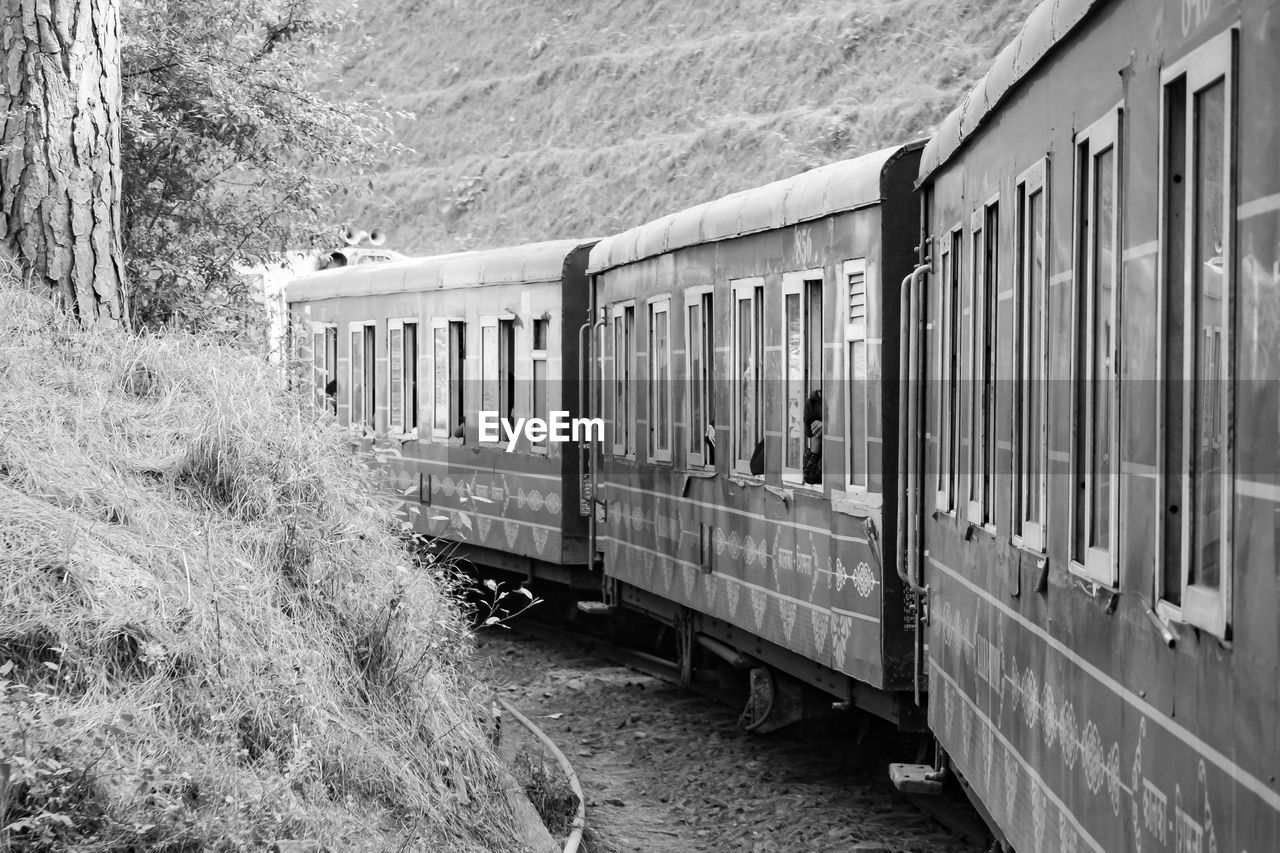 Toy train from kalka to shimla in india, toy train moving on mountain slope