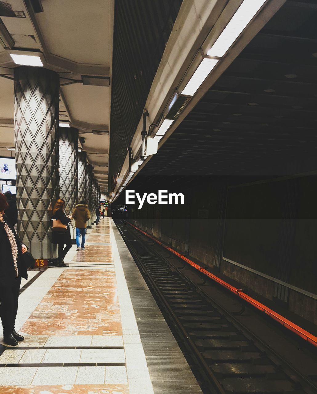 People waiting at subway station