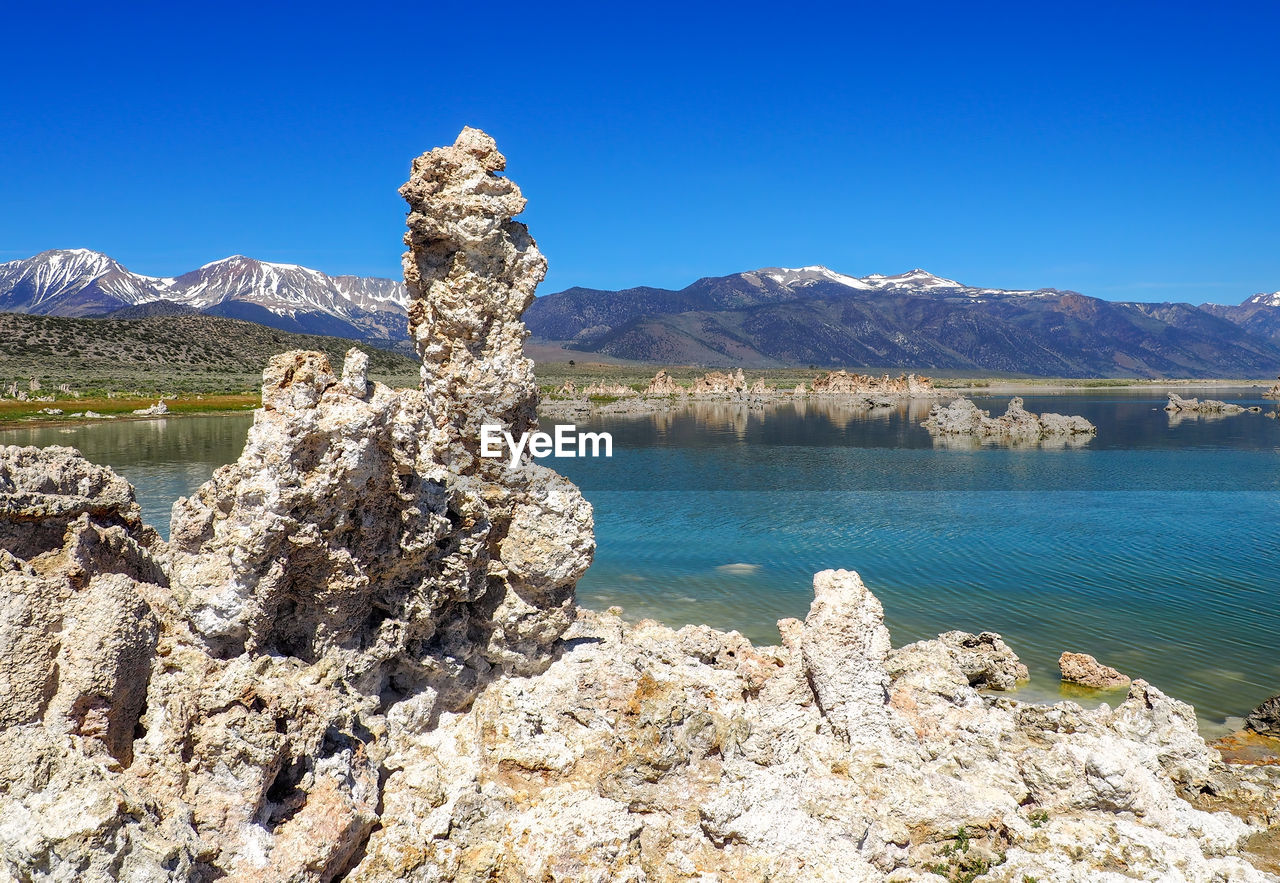 scenic view of sea against blue sky