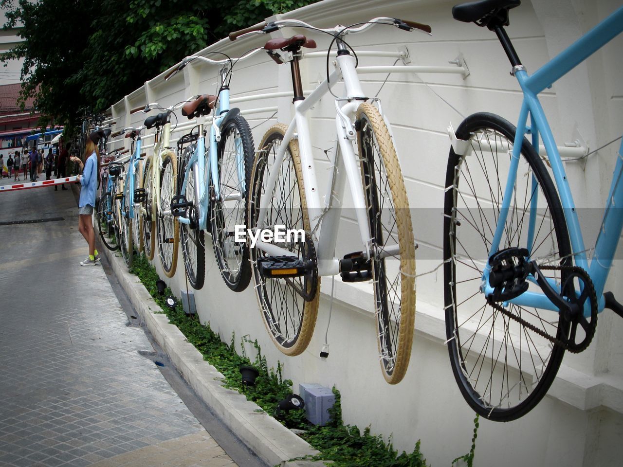 CARS PARKED IN FRONT OF WALL