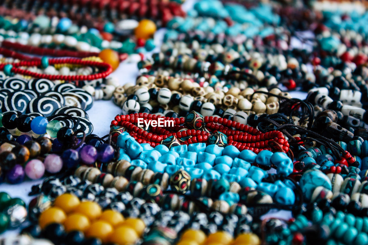 Close-up of multi colored decorations for sale in market