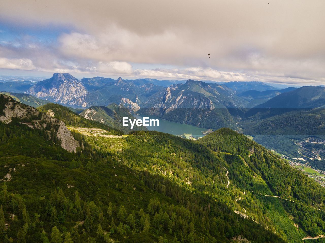 SCENIC VIEW OF MOUNTAIN RANGE AGAINST SKY