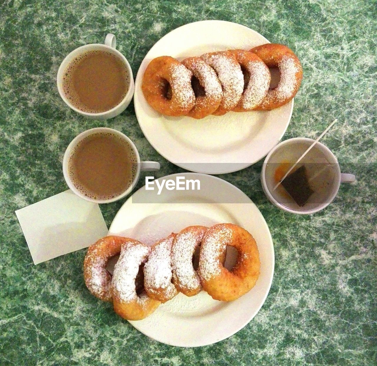 HIGH ANGLE VIEW OF COFFEE AND BREAD ON TABLE